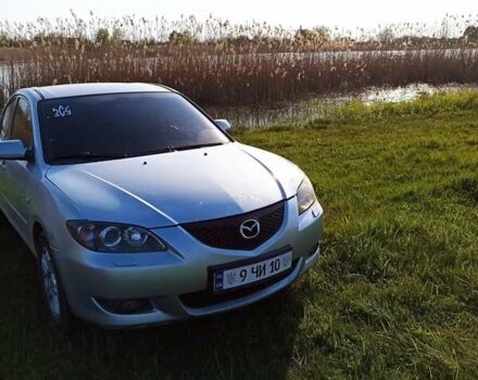 Серый Мазда 3, объемом двигателя 1 л и пробегом 299 тыс. км за 4300 $, фото 1 на Automoto.ua