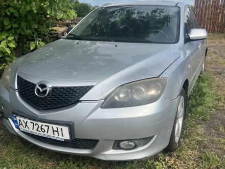 Сірий Мазда 3, об'ємом двигуна 2 л та пробігом 250 тис. км за 1000 $, фото 1 на Automoto.ua