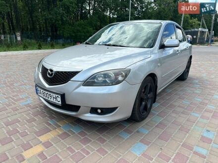 Серый Мазда 3, объемом двигателя 2 л и пробегом 257 тыс. км за 3600 $, фото 1 на Automoto.ua