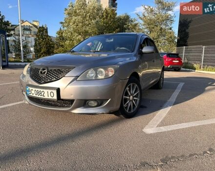 Серый Мазда 3, объемом двигателя 2 л и пробегом 242 тыс. км за 3500 $, фото 1 на Automoto.ua