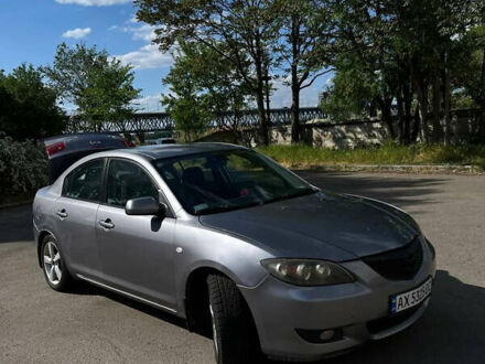 Серый Мазда 3, объемом двигателя 2 л и пробегом 330 тыс. км за 4000 $, фото 1 на Automoto.ua