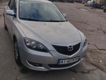 Серый Мазда 3, объемом двигателя 1.6 л и пробегом 330 тыс. км за 4000 $, фото 1 на Automoto.ua