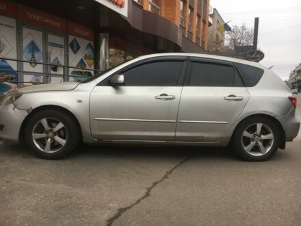 Сірий Мазда 3, об'ємом двигуна 2 л та пробігом 198 тис. км за 3000 $, фото 1 на Automoto.ua
