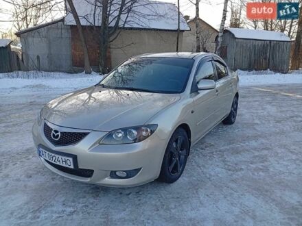 Серый Мазда 3, объемом двигателя 1.6 л и пробегом 245 тыс. км за 3600 $, фото 1 на Automoto.ua