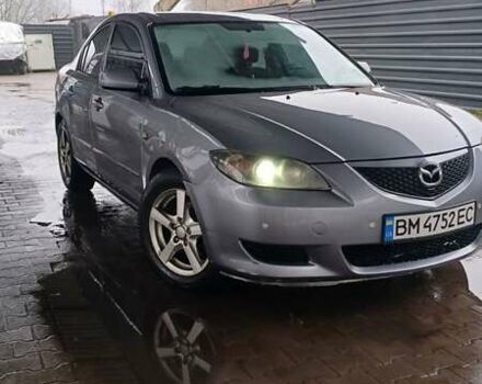 Серый Мазда 3, объемом двигателя 1.6 л и пробегом 360 тыс. км за 2600 $, фото 1 на Automoto.ua