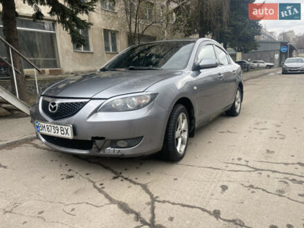 Серый Мазда 3, объемом двигателя 1.6 л и пробегом 330 тыс. км за 4000 $, фото 1 на Automoto.ua