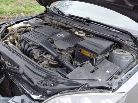 Серый Мазда 3, объемом двигателя 1.6 л и пробегом 244 тыс. км за 4500 $, фото 1 на Automoto.ua