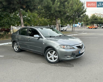 Серый Мазда 3, объемом двигателя 1.6 л и пробегом 180 тыс. км за 3000 $, фото 1 на Automoto.ua
