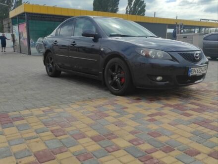Серый Мазда 3, объемом двигателя 1.6 л и пробегом 299 тыс. км за 6780 $, фото 1 на Automoto.ua