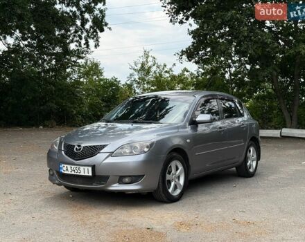 Серый Мазда 3, объемом двигателя 1.6 л и пробегом 255 тыс. км за 3450 $, фото 1 на Automoto.ua