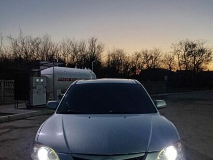 Серый Мазда 3, объемом двигателя 2 л и пробегом 200 тыс. км за 4500 $, фото 1 на Automoto.ua