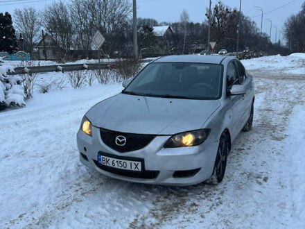 Серый Мазда 3, объемом двигателя 1.6 л и пробегом 325 тыс. км за 3000 $, фото 1 на Automoto.ua