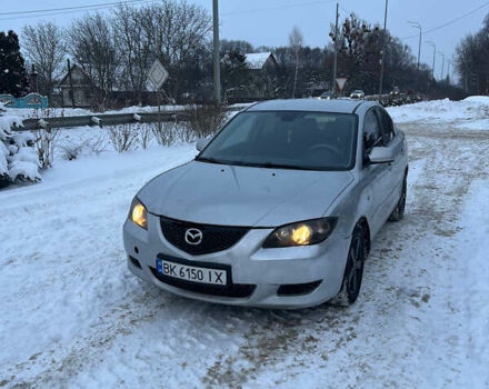 Серый Мазда 3, объемом двигателя 1.6 л и пробегом 325 тыс. км за 3000 $, фото 1 на Automoto.ua
