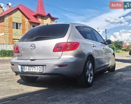 Серый Мазда 3, объемом двигателя 1.6 л и пробегом 214 тыс. км за 6650 $, фото 1 на Automoto.ua