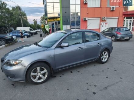 Серый Мазда 3, объемом двигателя 2 л и пробегом 350 тыс. км за 3450 $, фото 1 на Automoto.ua