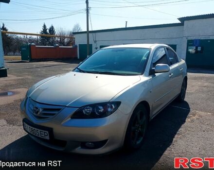 Серый Мазда 3, объемом двигателя 1.6 л и пробегом 307 тыс. км за 3999 $, фото 1 на Automoto.ua