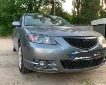 Серый Мазда 3, объемом двигателя 2 л и пробегом 285 тыс. км за 3000 $, фото 1 на Automoto.ua