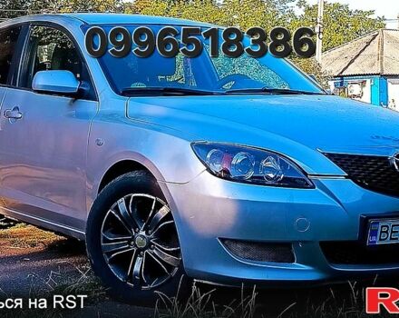 Серый Мазда 3, объемом двигателя 2 л и пробегом 255 тыс. км за 3500 $, фото 1 на Automoto.ua