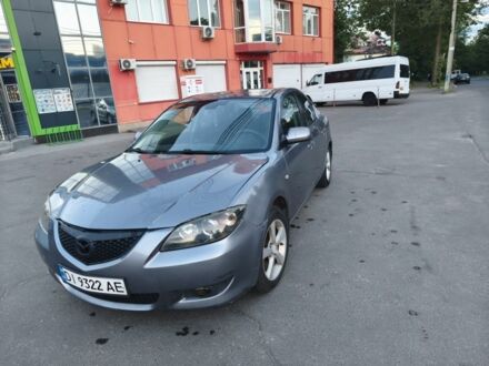 Сірий Мазда 3, об'ємом двигуна 2 л та пробігом 350 тис. км за 3450 $, фото 1 на Automoto.ua