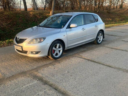 Сірий Мазда 3, об'ємом двигуна 1.56 л та пробігом 315 тис. км за 3999 $, фото 1 на Automoto.ua