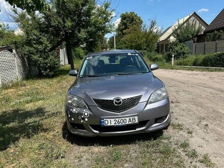 Серый Мазда 3, объемом двигателя 2 л и пробегом 312 тыс. км за 3000 $, фото 1 на Automoto.ua