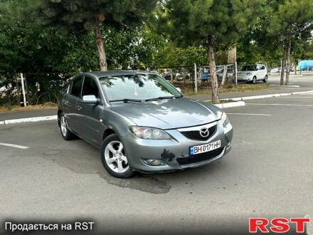 Серый Мазда 3, объемом двигателя 1.6 л и пробегом 180 тыс. км за 3500 $, фото 1 на Automoto.ua