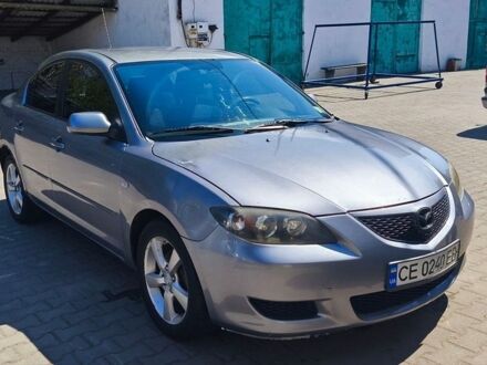 Серый Мазда 3, объемом двигателя 2 л и пробегом 190 тыс. км за 3500 $, фото 1 на Automoto.ua