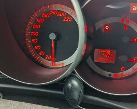 Серый Мазда 3, объемом двигателя 2 л и пробегом 145 тыс. км за 3999 $, фото 1 на Automoto.ua