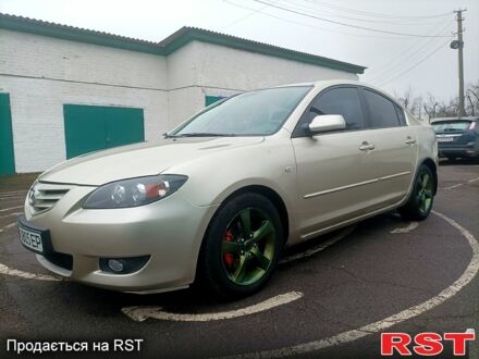 Серый Мазда 3, объемом двигателя 1.6 л и пробегом 300 тыс. км за 4800 $, фото 1 на Automoto.ua