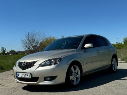 Серый Мазда 3, объемом двигателя 1.6 л и пробегом 145 тыс. км за 3800 $, фото 1 на Automoto.ua