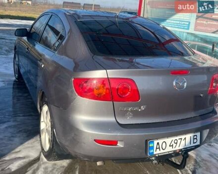 Серый Мазда 3, объемом двигателя 1.56 л и пробегом 211 тыс. км за 3900 $, фото 1 на Automoto.ua