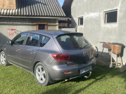 Серый Мазда 3, объемом двигателя 1.56 л и пробегом 295 тыс. км за 4000 $, фото 1 на Automoto.ua