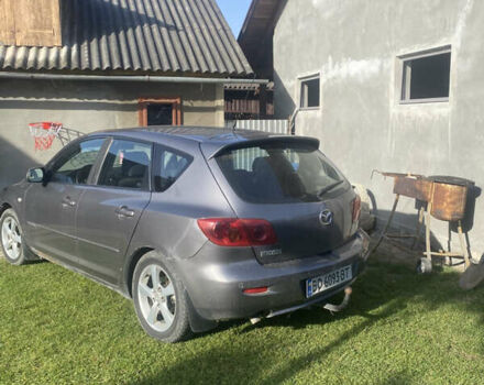 Серый Мазда 3, объемом двигателя 1.56 л и пробегом 295 тыс. км за 4000 $, фото 1 на Automoto.ua
