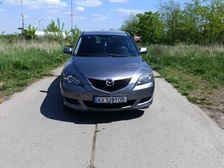 Серый Мазда 3, объемом двигателя 1.6 л и пробегом 196 тыс. км за 5000 $, фото 1 на Automoto.ua
