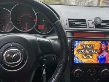 Серый Мазда 3, объемом двигателя 1.6 л и пробегом 355 тыс. км за 3200 $, фото 1 на Automoto.ua