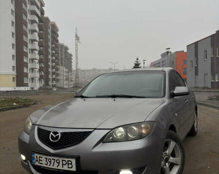 Серый Мазда 3, объемом двигателя 1.6 л и пробегом 297 тыс. км за 4300 $, фото 1 на Automoto.ua
