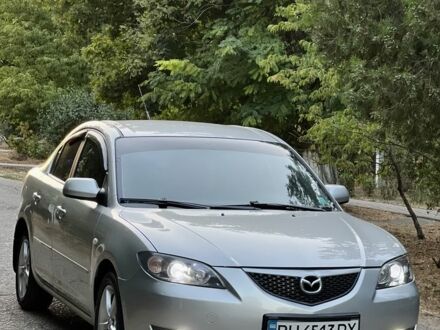 Серый Мазда 3, объемом двигателя 1.6 л и пробегом 202 тыс. км за 5100 $, фото 1 на Automoto.ua
