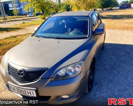 Серый Мазда 3, объемом двигателя 1.6 л и пробегом 296 тыс. км за 4000 $, фото 1 на Automoto.ua
