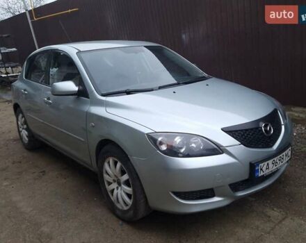 Серый Мазда 3, объемом двигателя 1.6 л и пробегом 206 тыс. км за 3950 $, фото 1 на Automoto.ua
