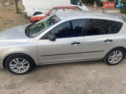 Серый Мазда 3, объемом двигателя 1.4 л и пробегом 221 тыс. км за 4799 $, фото 1 на Automoto.ua