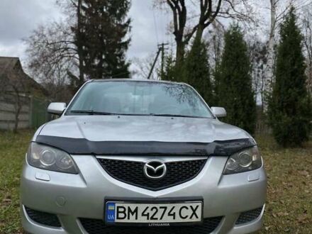 Серый Мазда 3, объемом двигателя 1.6 л и пробегом 320 тыс. км за 4000 $, фото 1 на Automoto.ua