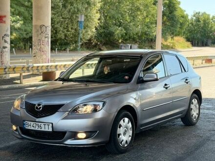 Серый Мазда 3, объемом двигателя 1.6 л и пробегом 255 тыс. км за 4350 $, фото 1 на Automoto.ua