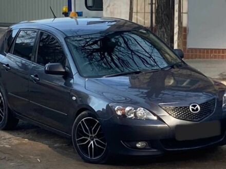 Серый Мазда 3, объемом двигателя 1.6 л и пробегом 280 тыс. км за 2800 $, фото 1 на Automoto.ua