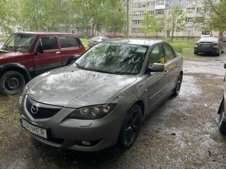 Серый Мазда 3, объемом двигателя 1.6 л и пробегом 350 тыс. км за 751 $, фото 1 на Automoto.ua