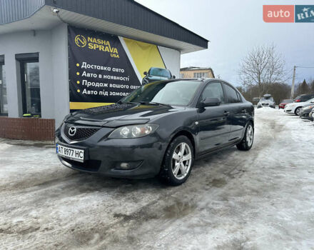 Серый Мазда 3, объемом двигателя 1.6 л и пробегом 245 тыс. км за 4700 $, фото 1 на Automoto.ua