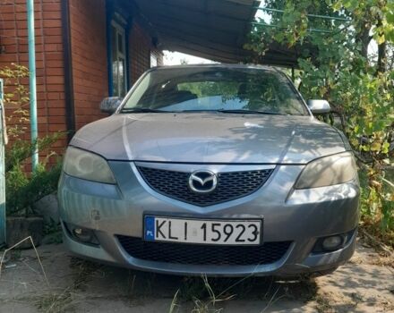Сірий Мазда 3, об'ємом двигуна 1 л та пробігом 330 тис. км за 2607 $, фото 1 на Automoto.ua