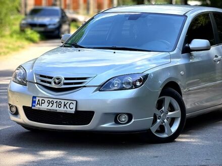 Сірий Мазда 3, об'ємом двигуна 2 л та пробігом 191 тис. км за 3999 $, фото 1 на Automoto.ua