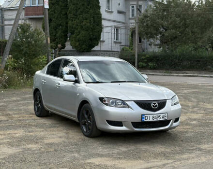 Серый Мазда 3, объемом двигателя 2 л и пробегом 300 тыс. км за 4600 $, фото 1 на Automoto.ua