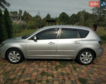 Серый Мазда 3, объемом двигателя 2 л и пробегом 184 тыс. км за 4200 $, фото 1 на Automoto.ua