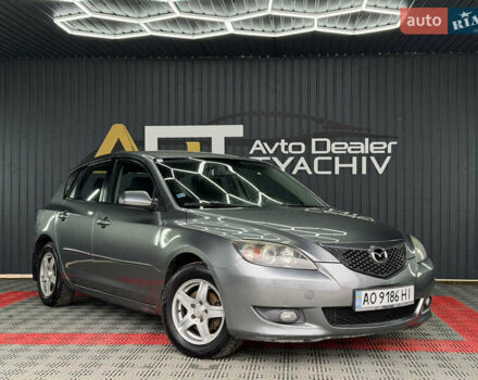 Серый Мазда 3, объемом двигателя 1.6 л и пробегом 301 тыс. км за 3400 $, фото 1 на Automoto.ua